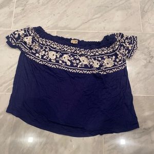 Rewind off the shoulder top.